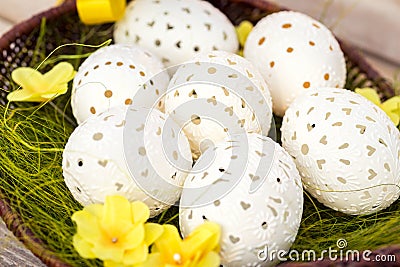 Beautiful unique Easter eggs in a basket Stock Photo