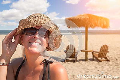 Beautiful Vacationing Woman Relaxing on The Beach Stock Photo