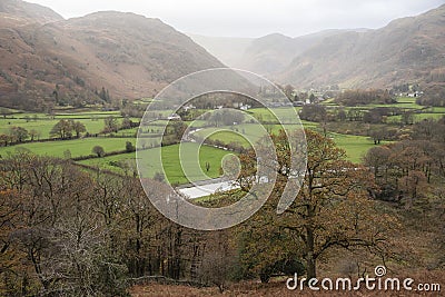 Beautiful vibrant Autumn landscape image towards Borrowdale Valley from Castle Crag in Lake Disrtrict Stock Photo