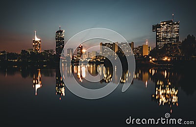Beautiful Vienna skyline on the Danube river at night Stock Photo