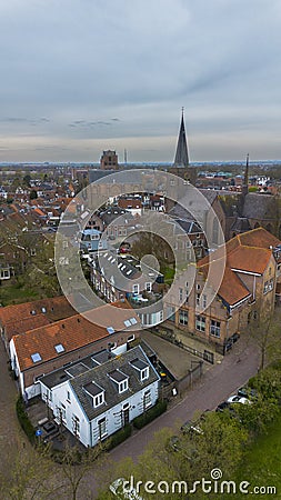 Beautiful view from above, from drone to orange, tiled roofs of houses. Top view of the Dutch city of Wijk bij Duurstede. Stock Photo