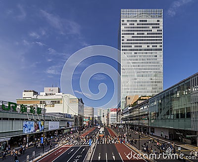 Beautiful view of the area around Shinjuku Station in Tokyo, Japan, lit by a sunny day`s afternoon light Editorial Stock Photo