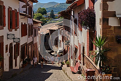 Beautiful view of the Basque village street in summer close to Ostabat in the Pyrenean foothills Editorial Stock Photo