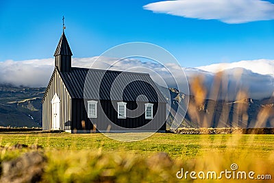 Beautiful view of a black wooden church in Budir, Iceland Stock Photo