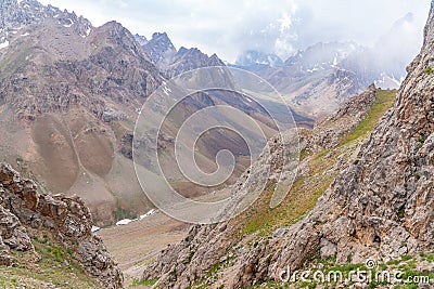 The beautiful view of blue sky and snow mountain summit near to Zmeya peak in Fann mountains in Tajikistan Stock Photo