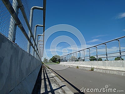 beautiful view on the bridge during the day with clear clouds. Stock Photo