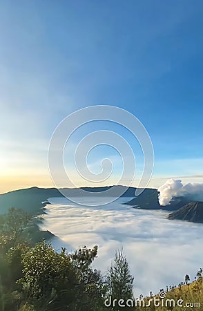 The beautiful view of the bromo tourist fog crater, very beautiful to look at at sunrise Stock Photo