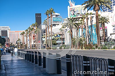 Beautiful view of a busy street in Las Vegas with hotels and palm trees on a sunny day. Nevada, USA Editorial Stock Photo