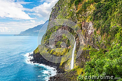 Beautiful view of Cascata do Veu da Noiva waterfall near Porto Moniz and Seixal. Madeira, Portugal Stock Photo