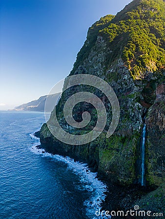 Beautiful view of cliffs and Corrego da Furna waterfall. Madeira, Portugal Stock Photo