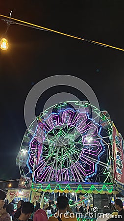 beautiful view of colorful lights in a bustling night market Editorial Stock Photo