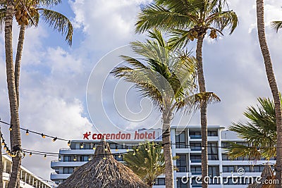 Beautiful view of the Corendon hotel building with palm trees against a blue sky with white clouds. Editorial Stock Photo