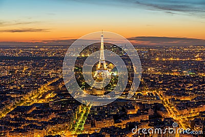 Beautiful view Eiffel tower during light show at dusk, Paris, France. Editorial Stock Photo