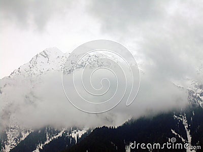 Beautiful View Of Foggy Landscape On a Wet Afternoon In Gulmarg, Jammu And Kashmir, India. Stock Photo