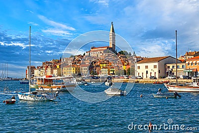 Beautiful view of the harbor, old town buildings and Campanile of Saint Euphemia Church of Rovinj city Editorial Stock Photo