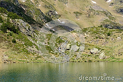 Beautiful view hiking in the Andorra Pyrenees Mountains in Ordino, near the Lakes of Tristaina Stock Photo