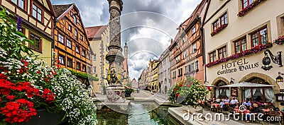 Beautiful view of the historic town of Rothenburg ob der Tauber with fountain, Franconia, Bavaria, Germany Stock Photo