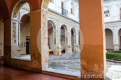 Beautiful view of an historical building with several archs in Xativa, Spain Stock Photo
