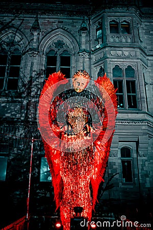 Beautiful view of the knife angel sculpture covered with red light in Barrow-in-Furness Editorial Stock Photo