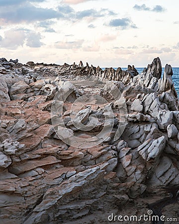 Beautiful view of the Makaluapuna Point or Dragon's Teeth, seaside rough lava rocks in Maui island Stock Photo