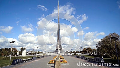 Beautiful view of monument with rocket on background of blue sky. Action. Front view of rocket monument in park in fine Editorial Stock Photo