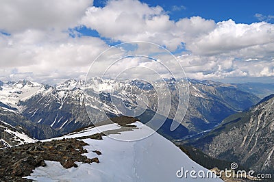 Beautiful view of the mountain landscape: mountain ranges, white clouds Stock Photo