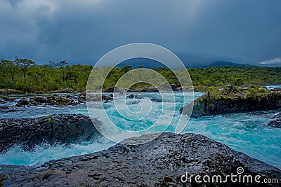 Beautiful view o turquoise water flowing in Petrohue River, Llanquihue Province, Los Lagos Region, Chile Stock Photo
