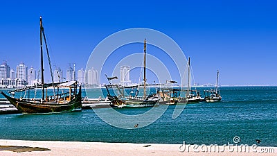 Beautiful view of old rusty boats in the sea under the clear sky Stock Photo