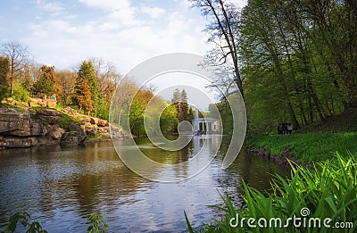 Beautiful view of the pond with the fountain Snake and the pavilion Flora in the National Dendrological Park Sofiyivka, Uman, Stock Photo