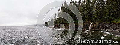 Beautiful View of a rocky coast with waterfall on the Juan de Fuca Trail Stock Photo