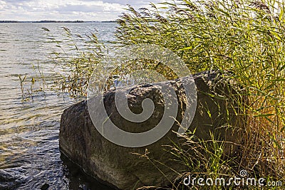 Beautiful view of rocky coast and waves Baltic sea near big rock. Beautiful nature landscape backgrounds. Sweden, Stock Photo