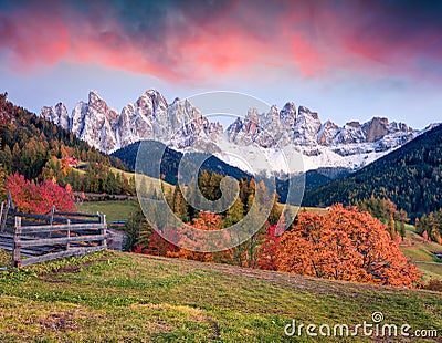 Beautiful view of Santa Maddalena village in front of the Geisler or Odle Dolomites Group. Colorful autumn sunset in Dolomite Alps Stock Photo
