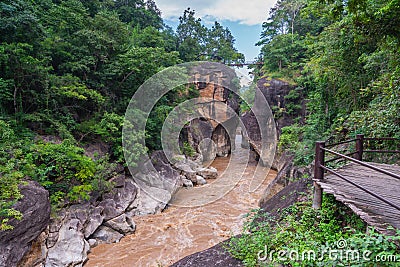 Beautiful view from small iron bridge over Op Luang Canyon and fast-flowing river in Op Luang National Park, Chiang Mai, Thailand Stock Photo