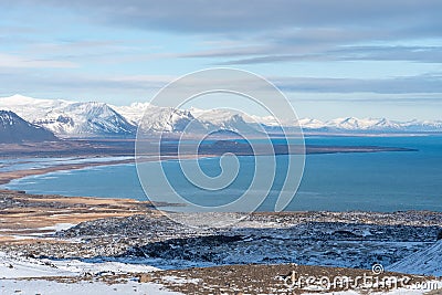 Beautiful view of snowcapped mountains along the Icelandic highway Stock Photo