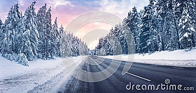 Beautiful view of the snowy curve country road in winter Stock Photo