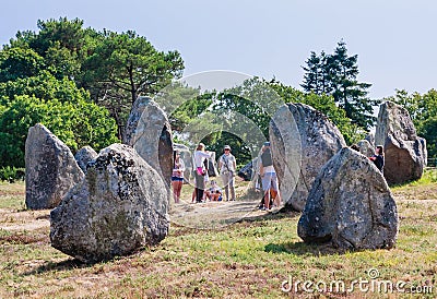 Beautiful view of the standing stones alignments, menhirs, in Carnac, Brittany, France. Megalithic landmark Editorial Stock Photo