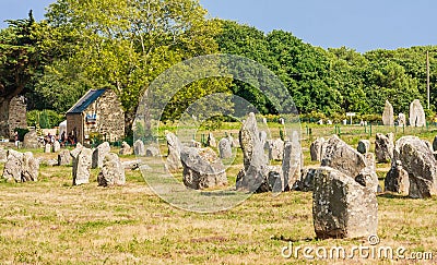 Beautiful view of the standing stones alignments, menhirs, in Carnac, Brittany, France. Megalithic landmark Editorial Stock Photo