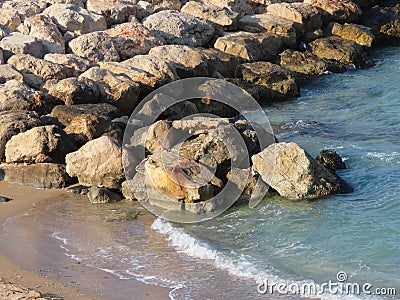 Beautiful view of the stones and the Mediterranean Sea in winter in Haifa in Israel. Stock Photo