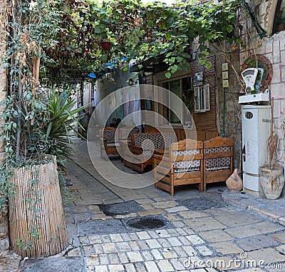 Beautiful view of a street cafe in the old city of Acre in Israel Editorial Stock Photo