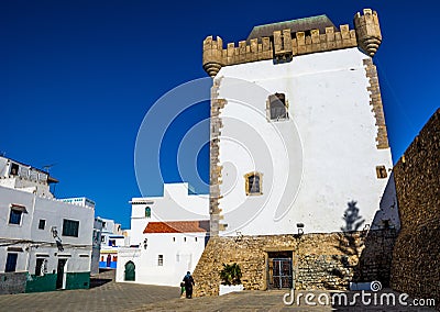 Beautiful view of street with typical arabic architecture in Asilah. Location: Asilah, North Morocco, Africa. Artistic picture. Editorial Stock Photo