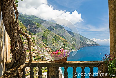 Beautiful view of the town of Positano from antique terrace with flowers Stock Photo