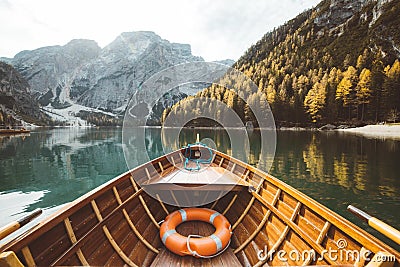 Traditional rowing boat at Lago di Braies in the Dolomites Stock Photo