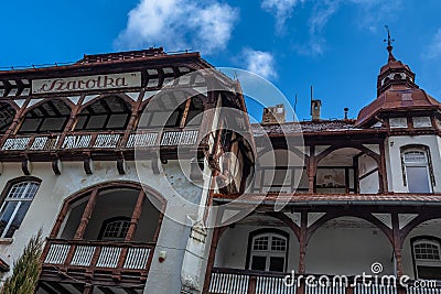 Beautiful view on urban white exterior house facade with scenic red roof in old narrow street of historic portuguese Editorial Stock Photo