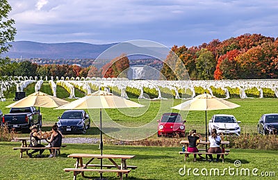 Beautiful View of a Vineyard with People Tasting Wine and Enjoying the Colorful Fall Foliage Editorial Stock Photo