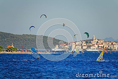 Beautiful view of windsurfers riding waves near the coast of Peljesac, Croatia. Stock Photo