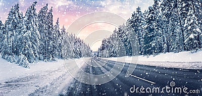 Beautiful view of the winter curve country road in snowstorm Stock Photo