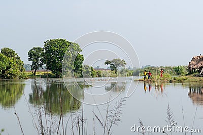 Beautiful views of nature on the banks of a river in West Bengal where some village boys are playing Editorial Stock Photo