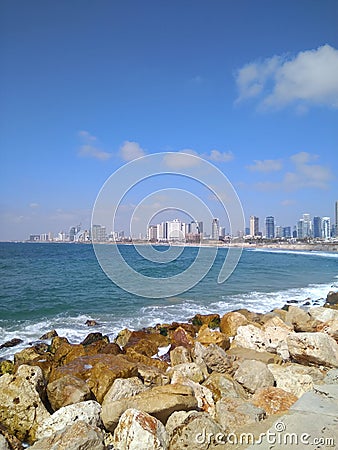 Beautiful views of the stones of the Mediterranean Sea and Tel Aviv in summer in Israel. Stock Photo