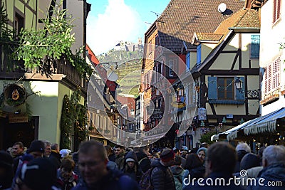 Beautiful village Riquewihr with historic buildings and colorful houses in Alsace of France - Famous vine route. Editorial Stock Photo