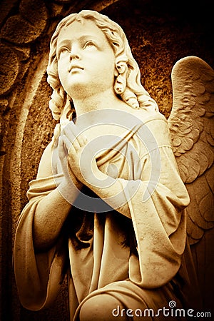 Beautiful vintage image of a praying angel Stock Photo